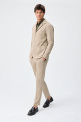 Beige mjuk jerseykostym med kavaj och byxor för män, elegant och casual