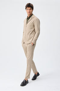 Beige mjuk jerseykostym med kavaj och byxor för män, elegant och casual