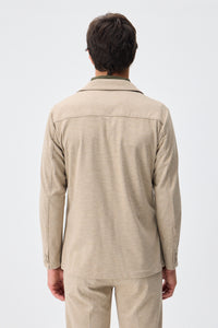 Beige mjuk jerseykostym med kavaj och byxor för män, elegant och casual