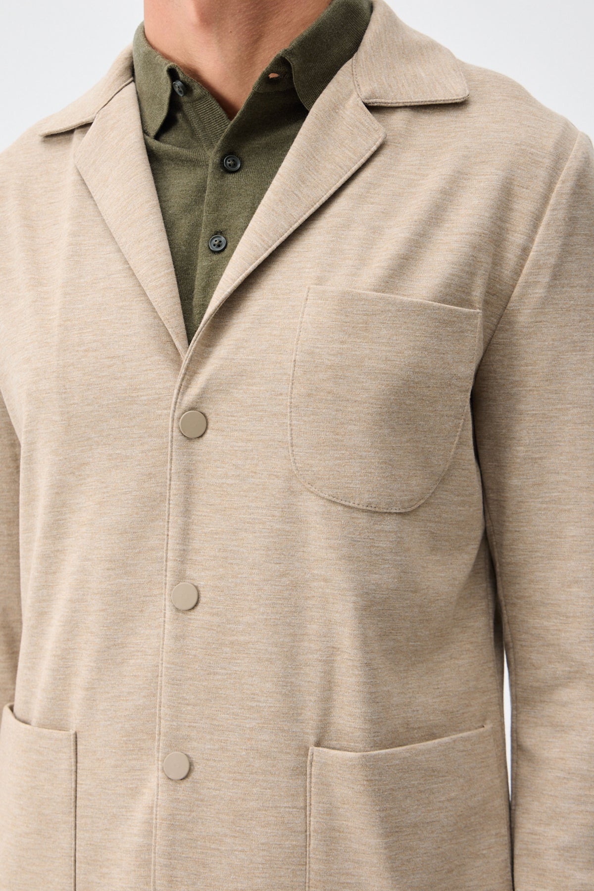 Beige mjuk jerseykostym med kavaj och byxor för män, elegant och casual