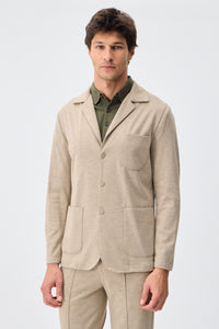 Beige mjuk jerseykostym med kavaj och byxor för män, elegant och casual