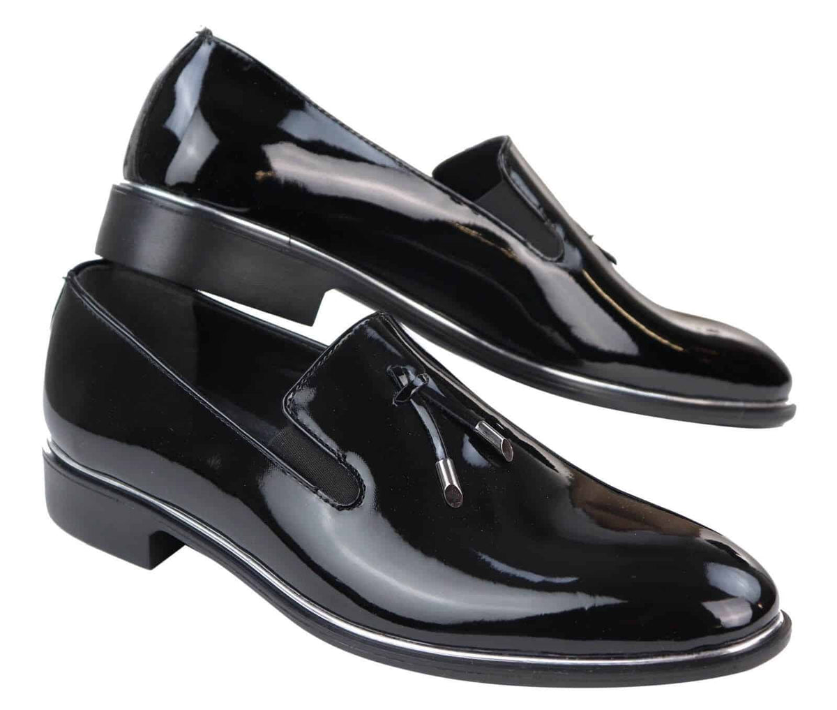 Herrslip-on tofsskor med metalldetaljer