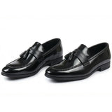 Herrloafers med tofs och högglans