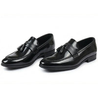 Herrloafers med tofs och högglans