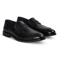 Ted - Svarta klassiska herrloafers i läder med mockatå